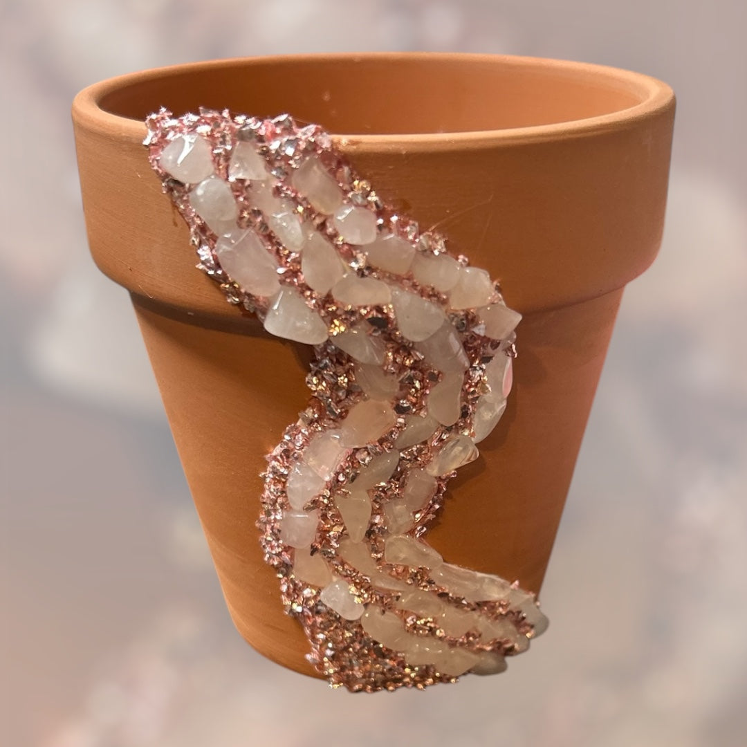 Natural colored Rose Quartz crystal pot